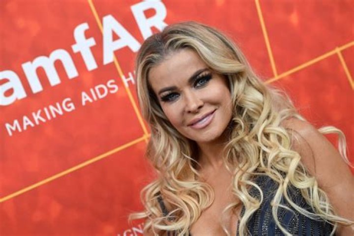 Carmen Electra in Bathing Suit Stuns in "Yellow" — Celebwell