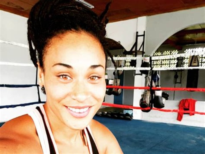 Pro Boxer Hanna Gabriels Shares Swimsuit Photo Cuddling Puppies