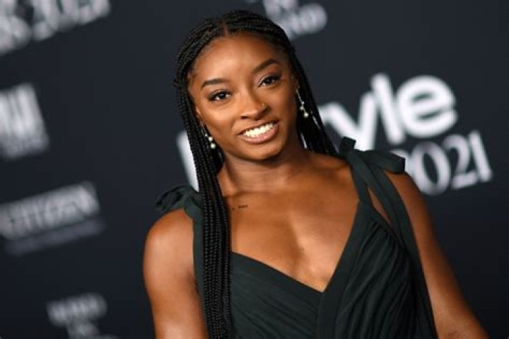 Simone Biles in Bathing Suit Enjoys "Beach & Sun" — Celebwell